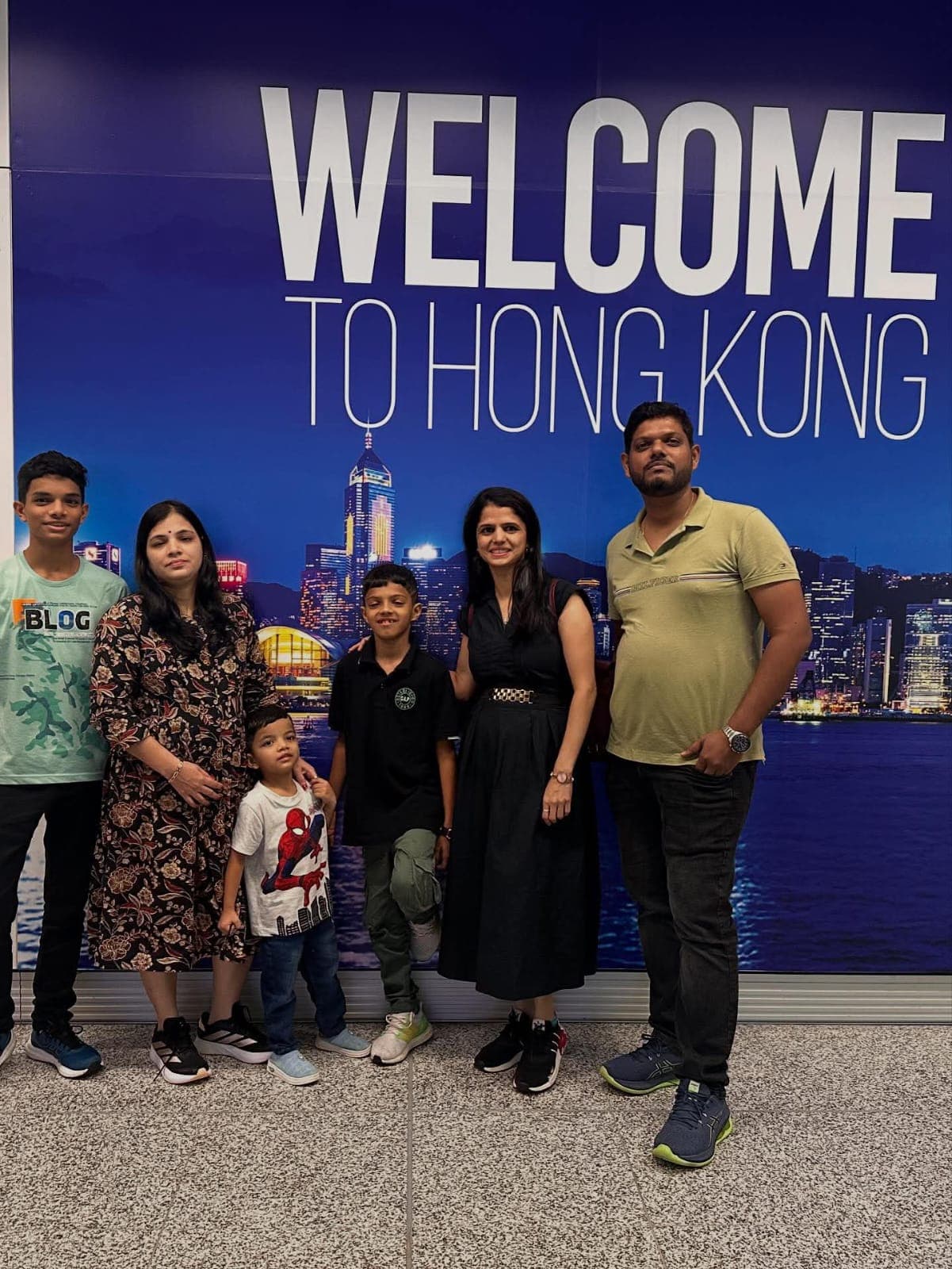 Group photo in front of welcome board